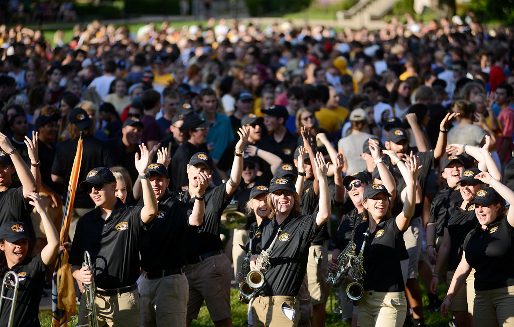 Marching Mizzou members dance together song "Hey Baby,"